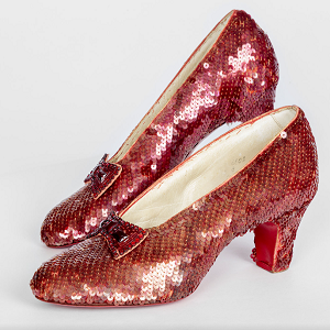 The ruby slippers from the Wizard of Oz, the two short heels are covered in red sequin and have small bows over the toe box.