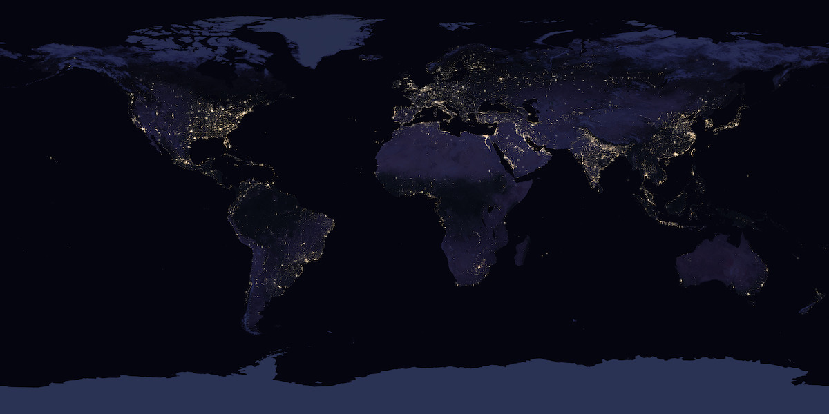 Map of the earth showing areas where lights can be seen from space at night