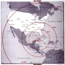 a map of the western hemisphere showing the united states in white. A red bullseye target centered on Cuba shows the range of various nuclear missiles with the outer rings reaching as far as Northern Canada.